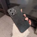 Close-up detail shot of the black glitter phone case, showing sparkling finish and camera cutouts. - iPhone 17 Pro Max / Black