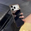 Electroplated mirror phone case with luxury gold frame and large camera cutout design. - Mirror Plating / Large Hole / Gold / iPhone 17