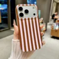 Detailed view of the brown striped iPhone phone case featuring IMD shockproof protection. - iPhone14 / White and Brown Stripes