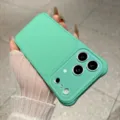 Mint green phone case detail shot showing camera protection window and soft touch matte finish. - 14Promax / Turquoise