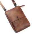 Brown vertical crossbody phone bag with shoulder strap and snap closure, ideal for daily use. - Dark Brown / Universal Within 7.1 Inches