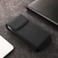 Close-up detail of black nylon vertical phone holster, universal waist bag for large smartphones. - Under 6.1 Inches / Black