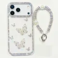 Strass Schmetterling Handyhülle mit Perlen Handschlaufe für iPhone, glitzerndes Hardcase. - iPhone17 / Glitzerweiß + Schmetterlinge + Armband