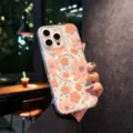 Clear magnetic phone case detail showing pink floral pattern and precision camera cutouts. - Pink / iPhone17