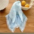 Light blue vintage triangular headscarf with delicate white lace trim for women daily. - Vintage Floral Blue and White
