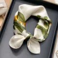 Elegant mulberry silk square scarf with classic green leaf and floral print for women. - Gold Chain Camellia