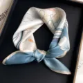 Blue silk small square scarf with elegant floral and bird print for women fashion styling. - Quiet Floral