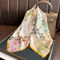 Elegant mulberry silk square scarf featuring traditional bamboo and plum blossom print design. - Peach Blossom Bamboo Forest