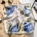 Silk square scarf variant, blue hydrangea floral print with green border, elegant women accessory. - Blue Hydrangea