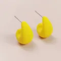 Close-up of bright yellow teardrop stud earrings, showing smooth minimalist geometric design. - Bright Yellow (A24-216B)