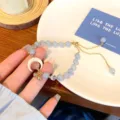 Sweet princess style aquamarine beaded bracelet with crescent moon charm and sliding chain. - Sea Shell Crescent Adjustable Style