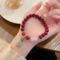 Chinese Style Cinnabar Peace Buckle Bracelet Retro Gemstone Jewelry Detail View Details - Jadeite Peace Buckle Style