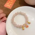 Pink gold foil glass bead bracelet with cute mini beast charms and red coin pendant. - Light Pink