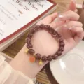 Vintage Chinese style gold foil glass bead bracelet with cute beast pendant for women. - Purple Grape