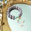 Purple glazed glass lotus bead bracelet with tassel variant, sweet style handmade jewelry item. - Purple Lotus & Hydrangea Style