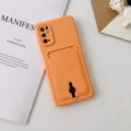 Détail de coque de téléphone en silicone orange avec poche porte-cartes et bague support. - Orange / REDMI NOTE11 4G