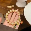 Sweet princess style glass beaded bracelet with cute golden beast charms for sweet girls daily wear - Green Orange Pink