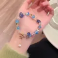 Crystal beaded bracelet detail, blue heart charm and pearl pendant, sweet daily jewelry accessory. - Blue Series