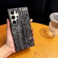 Snake skin texture phone case with wrist strap and magnetic stand for Samsung Galaxy. - Silver Black with Strap