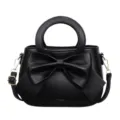 Black leather handbag with bow and round handle, stylish women's shoulder crossbody bag. - Black
