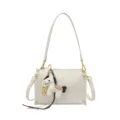 White PU leather shoulder crossbody bag featuring a cute horse charm and gold hardware. - White With Pendant