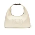 White leather hobo shoulder bag with cute bow design and metallic buckle closure for women. - White