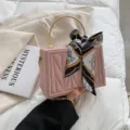 Stylish pink box handbag with chic silk scarf, gold top handle and chain strap for women. - Pink