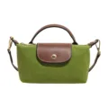 Bolso bandolera de nailon verde con solapa de cuero marrón y asa para mujeres elegantes - Verde Hierba