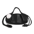 Black Napa leather dumpling handbag in black, featuring top handle and fluffy pom-pom. - Without Pendant / Black
