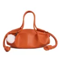 Orange napa leather handbag with fluffy pom pom charm, stylish knotted dumpling shoulder bag. - Without Pendant / Orange
