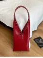 Vintage red shoulder bag for women, chic PU leather hobo tote with metal grommet and tie details. - Burgundy
