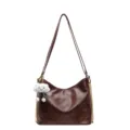 Dark brown soft leather hobo shoulder bag with chic gold chains and cute cloud pendant for women. - Coffee