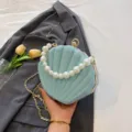 Elegant glitter shell evening bag with pearl handle and metal chain for women chic parties. - One Size / Blue