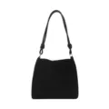Closeup of black shoulder bag featuring stylish knotted handles and minimalist design details. - Black
