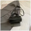 Black cylindrical crossbody bag, trendy Boston bowling handbag for women commuting. - Black