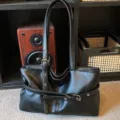 Classic black PU leather shoulder bag for women, stylish large capacity commuter tote handbag. - Black