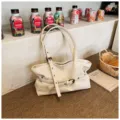 Stylish minimalist beige PU leather shoulder tote bag for women, large capacity commuting bag. - Beige