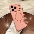 Close-up shot of pink leather magnetic phone case with camera protection and fine holes design. - iPhone15 / Pink