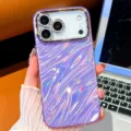 Purple electroplated wave phone case detail view, shiny shell texture for iPhone protection. - Wavy Purple / iPhone17