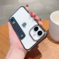 Detailed view of electroplated acrylic phone case with wristband stand for iPhone clear back - iPhone 16 SE / Classic Black