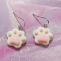 Close-up detail of cute pink and white resin cat paw drop earrings with metal fishhook wires. - Pink and White Cat Paw Style (A24-257B)