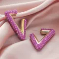 Elegant pink crystal V-shaped hoop earrings for women, stylish geometric daily jewelry. - Geometric V-Shape Pink Rhinestone Style (A24-299)