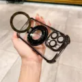 Vista detallada de la funda magnética transparente para teléfono con soporte plegable y protección. - Cojín de aire en las cuatro esquinas / Negro / iPhone 16E