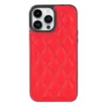 Close-up detail of red quilted leather phone case featuring a convenient card slot pocket. - Red