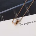 Roestvrij stalen roterende cilindrische hangketting met parelmoer inleg, chique dames sieraden. - Roségoud / Wit Moederschelp / Sleutelbeentketting