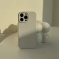 Funda de silicona líquida beige para iPhone, carcasa protectora suave con acabado mate. - iPhone 15 Pro / Gris Roca