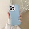 Detail view of light blue liquid silicone phone case with white camera protection frame. - Sky Blue