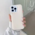 Detailed close-up view of the beige liquid silicone phone case highlighting its smooth texture. - iPhone 14 / Off White