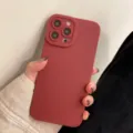 Matte silicone phone case detail showcasing precise camera protection and red finish. - For 12pro max / Burgundy