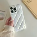 White quilted iPhone case detail showing soft material and diamond pattern texture. - iPhone 12 / White